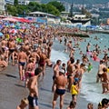 The beach, the sea, a lot of people vacationing. Royalty Free Stock Photo