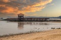 Beach and sea pier under the sunset by the sea Royalty Free Stock Photo