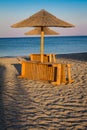 Beach and sea view with sunshades at sunset chillout color split toning Royalty Free Stock Photo