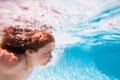 Beach sea and water fun. Child swim and dive underwater in the swimming pool. Royalty Free Stock Photo