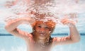 Beach sea and water fun. Underwater. Child in the swimming pool. Cute kid boy swimming in pool under water. Royalty Free Stock Photo