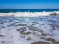 Beach sea waves foam Royalty Free Stock Photo