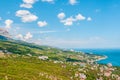 Beach at the seaside, blue water, view from above the mountains to the town of Simeiz, Yalta, Crimea Royalty Free Stock Photo