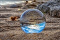 Beach seen in a glass ball Royalty Free Stock Photo