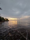 At the beach. The setting sun brings with it a beauty and serenity that suggests that it is time for a short break