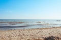 Beach on the shore of the ocean, the sea is a clear sunny summer Royalty Free Stock Photo