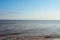 Beach on the shore of the ocean, the sea is a clear sunny summer Royalty Free Stock Photo