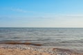 Beach on the shore of the ocean, the sea is a clear sunny summer Royalty Free Stock Photo