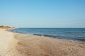 Beach on the shore of the ocean, the sea is a clear sunny summer Royalty Free Stock Photo