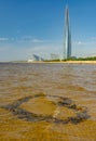 A beach on the shores of the Gulf of Finland overlooking the Lakhta Center, a skyscraper in St. Petersburg that will house the