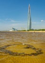 A beach on the shores of the Gulf of Finland overlooking the Lakhta Center, a skyscraper in St. Petersburg that will house the