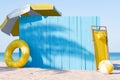 Beach Sign with Yellow Deck Chair, Umbrella, and Beach Ball Royalty Free Stock Photo