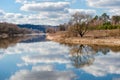 Beach and sky reflected in the river Royalty Free Stock Photo
