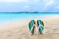 Beach slippers in the sand at Maldives Royalty Free Stock Photo