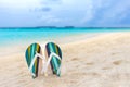 Beach slippers in the sand at Maldives Royalty Free Stock Photo