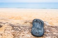 Beach slippers on a sandy beach in Phuket, Thailand Royalty Free Stock Photo