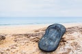 Beach slippers on a sandy beach in Phuket, Thailand Royalty Free Stock Photo