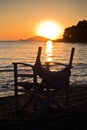 Beach with small director like chair at sunset in Sithonia