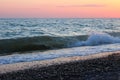 Beach and small waves in the sea, sea foam