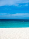 Beach solitude in Aruba with perfect blue sky