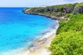 Beach of the 1000 steps in Bonaire on a rock Royalty Free Stock Photo