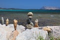 Beach stone cairns in Sardinia, Italy