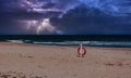 beach during the storm with lightning