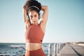 Beach, stretching and portrait of a woman athlete doing exercise before running or training for a race or marathon Royalty Free Stock Photo