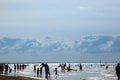 Beach in summer with tents, sun and blue sky Royalty Free Stock Photo