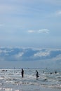 Beach in summer with tents, sun and blue sky Royalty Free Stock Photo