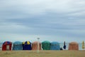 Beach in summer with tents, sun and blue sky Royalty Free Stock Photo