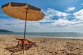 Beach summer travel vacation concept with chair umbrella white sand beach