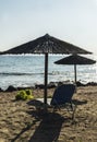 Beach in summer with an umbrella and sunbed