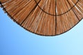 Beach sun umbrella made of bamboo.