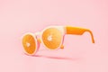 Beach sunglasses concept on pink paper background Royalty Free Stock Photo