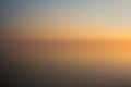 Beach at sunset blurred background