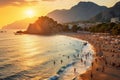 Beach at sunset in Budva, Montenegro, Europe, Kaputas beach. People enjoy sun and sea at the beautiful turquoise sea and sandy