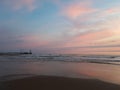 Beach sunset pier the Netherlands Royalty Free Stock Photo