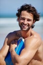 Beach surfboard, sports portrait and man smile for ocean freedom, sea waves or Portugal surf training vacation Royalty Free Stock Photo