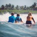 at the beach, surfers swiming in the sea and having fun in summer. Extreme sport and vacation concept. Father and Royalty Free Stock Photo