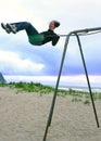 Beach Swinging fun! Royalty Free Stock Photo