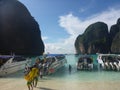 The beach, Thailand. Speed boats in the water.