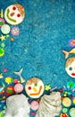 Beach theme flatlay with shells, fish tails, summer party icons and cookies.