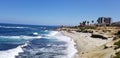 Beach time in the sun and sand on the Pacific Ocean - La Jolla, California Royalty Free Stock Photo