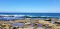 Beach time in the sun and sand on the Pacific Ocean - La Jolla, California Royalty Free Stock Photo