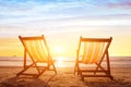 beach tourism, holiday background with couple of deck chairs