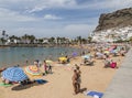 Beach, town and cliff at Puerto de Mogan on Gran Canaria, one of the Canary Islands. Royalty Free Stock Photo