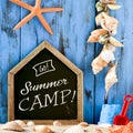 Beach toys, seashells and text summer camp Royalty Free Stock Photo