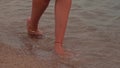Beach travel concept. Sexy Legs on Tropical Sand Beach.