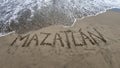 sand with hand drawing letters for beach travel and tropical tourism Royalty Free Stock Photo